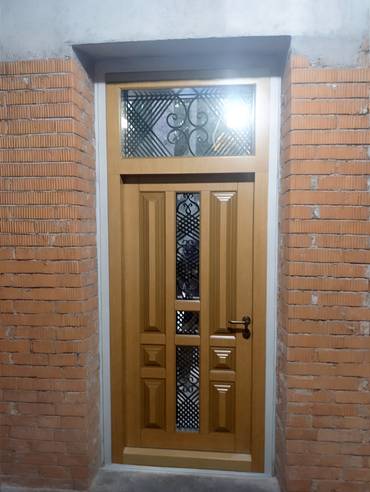Термодверь с МДФ и ковкой